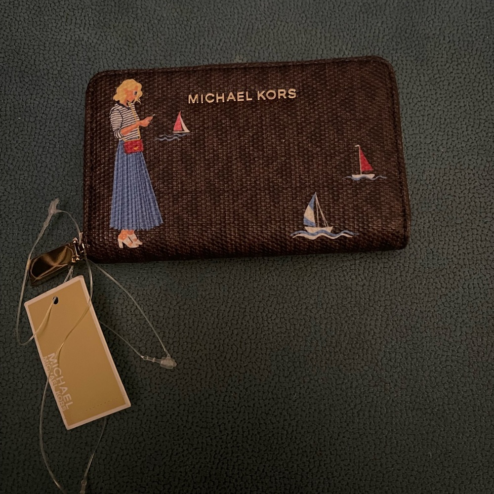 HTF—NWT Michael Kors sailer girl wallet.
